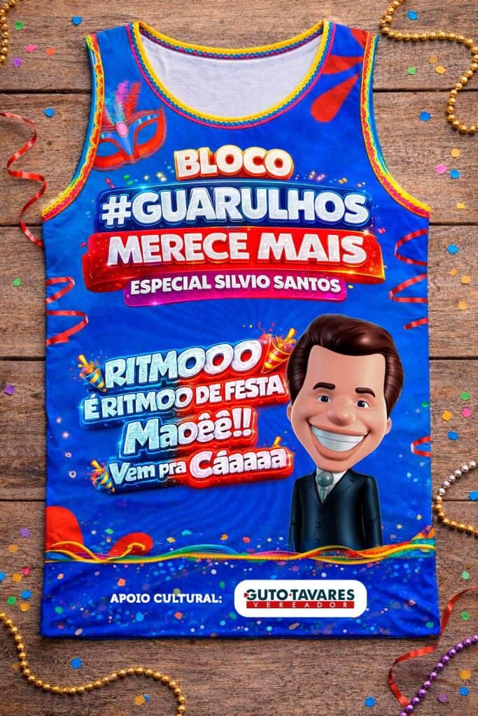 Abadá azul do Bloco Guarulhos Merece Mais com ilustração do apresentador Silvio Santos e a frase 'Ritmo de Festa'. Camiseta oficial do evento de Carnaval em Guarulhos com apoio cultural de Guto Tavares.